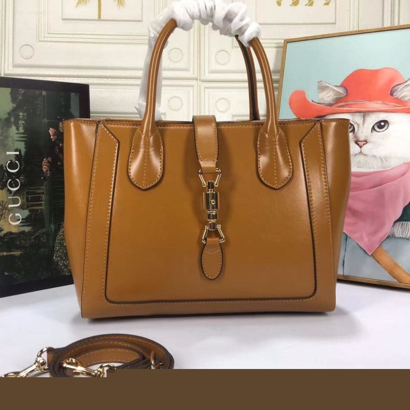 G*u*i shopping bags